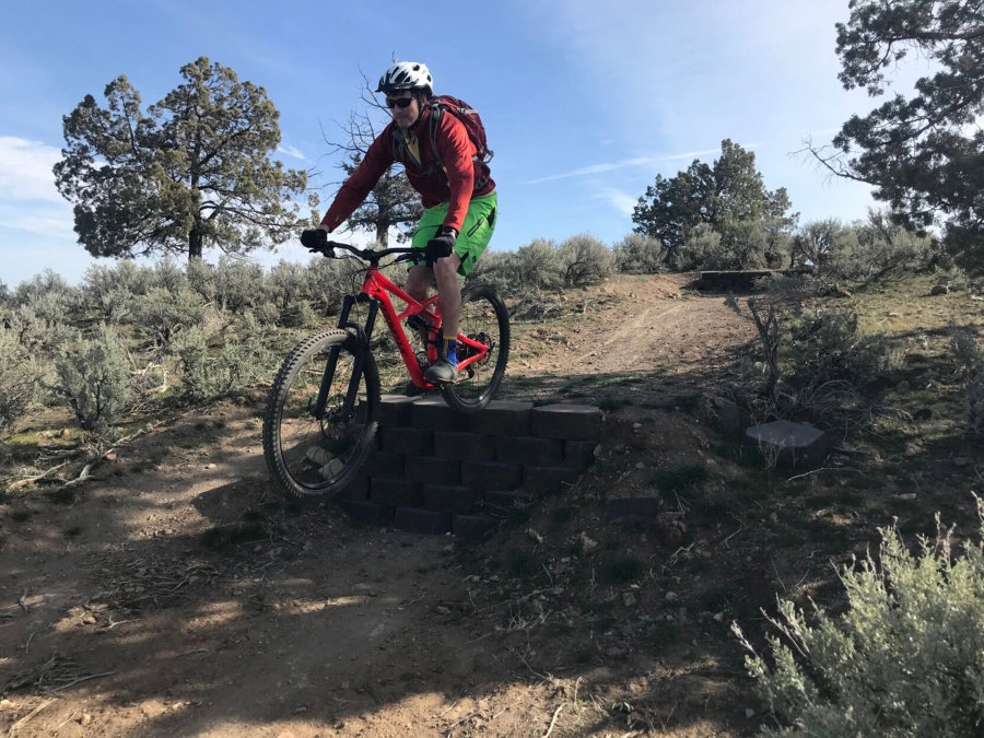 Andrew Williams of Bend, Ore., rides a concrete drop at the Madras East Hills trail system.
