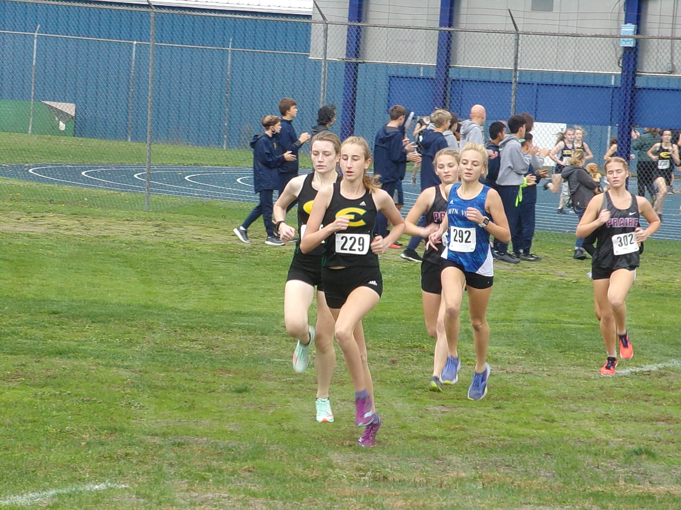 Claire Rogge sets the early pace on her way to winning the 3A district cross country meet on Thursday, Oct.