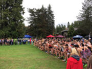 Runners line up at the start of the Class 2A boys race at the 2A/1A district cross country championships on Thursday at Lewis River Golf Course east of Woodland.