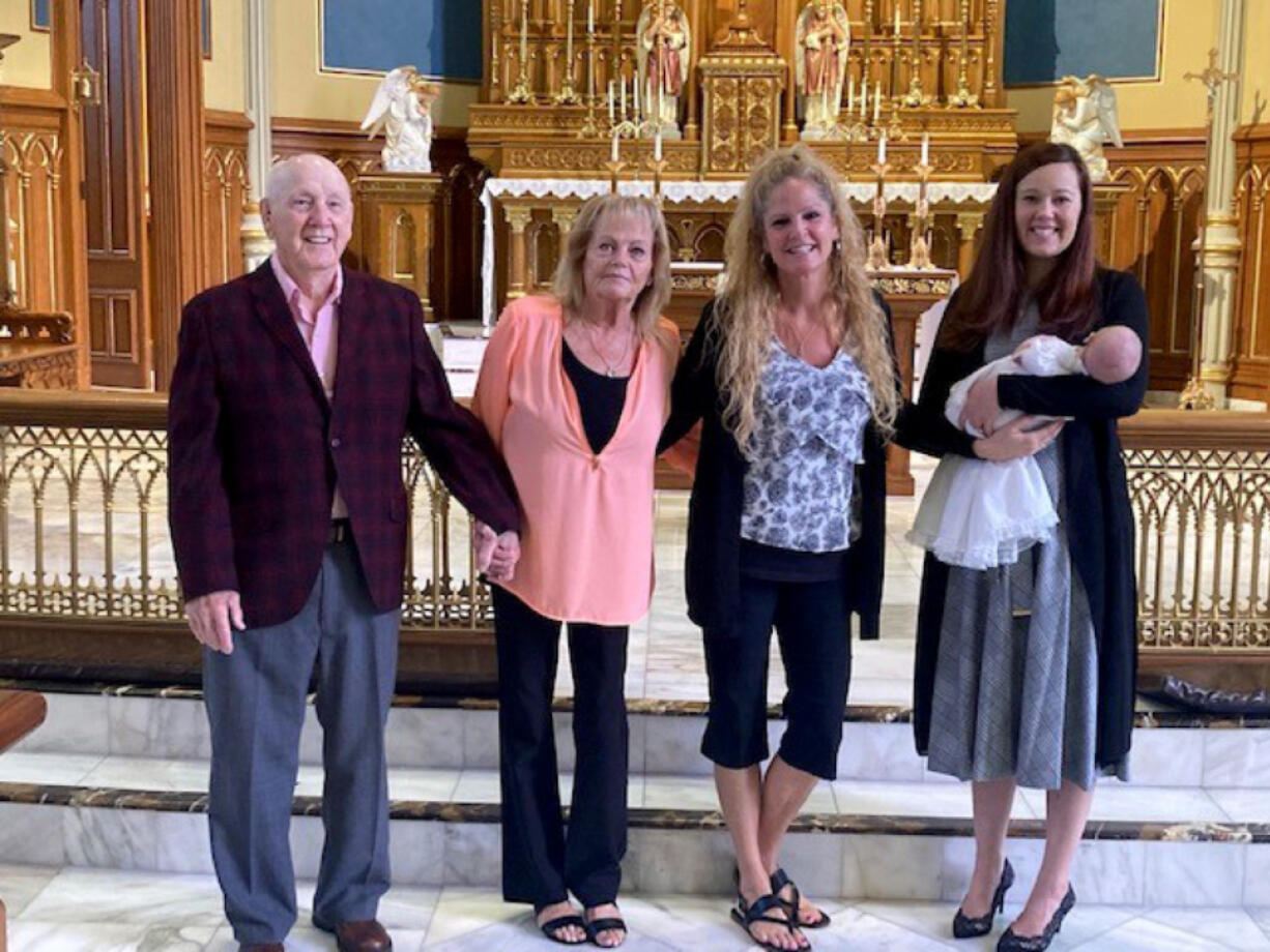 5 generations of family members gather for Vivian Trost's baptism.