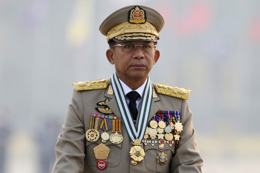 FILE - In this March 27, 2021, file photo, Myanmar's Commander-in-Chief Senior Gen. Min Aung Hlaing presides an army parade on Armed Forces Day in Naypyitaw, Myanmar. Southeast Asian foreign ministers have agreed to downgrade Myanmar's participation in its Oct. 26-28, 2021 summit in their sharpest rebuke yet of its leaders following a Feb. 1 military takeover.