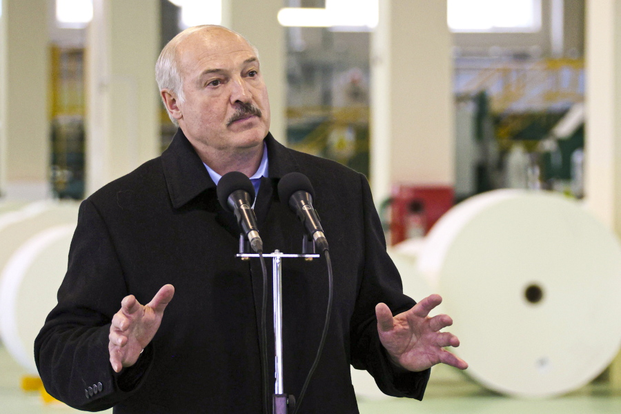 Belarus President Alexander Lukashenko gestures while speaking during his visit to the Dobrush Paper Mill "Geroy Truda" in Dobrush, Belarus, Friday, Oct. 29, 2021.