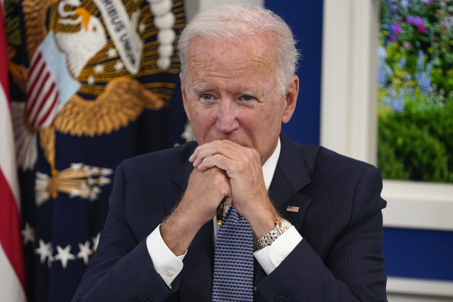 President Joe Biden listens during a meeting with business leaders about the debt limit in the South Court Auditorium on the White House campus, Wednesday, Oct. 6, 2021, in Washington.