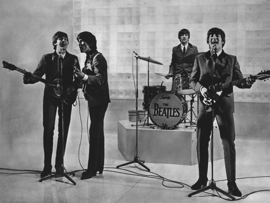 FILE - The Beatles are seen performing, date unknown. From left to right: Paul McCartney, George Harrison, Ringo Starr, and John Lennon. McCartney has revisited the breakup of The Beatles, refuting the suggestion that he was responsible for the group's demise. Speaking on an episode of BBC Radio 4's "This Cultural Life'' that is scheduled to air Oct 23, McCartney said it was John Lennon who wanted to disband The Beatles.