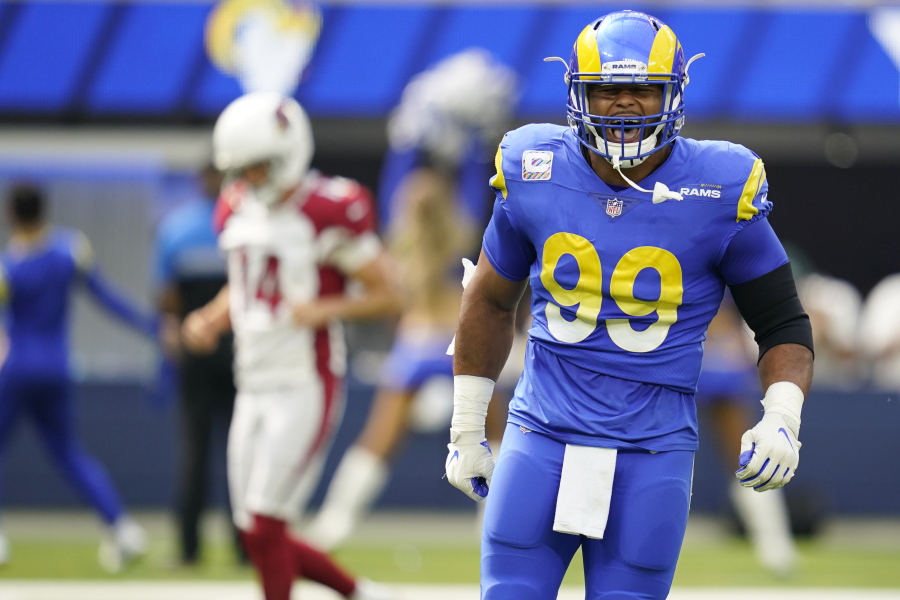 Los Angeles Rams defensive end Aaron Donald (99) will once again give chase to Seattle Seahawks quarterback Russell Wilson.