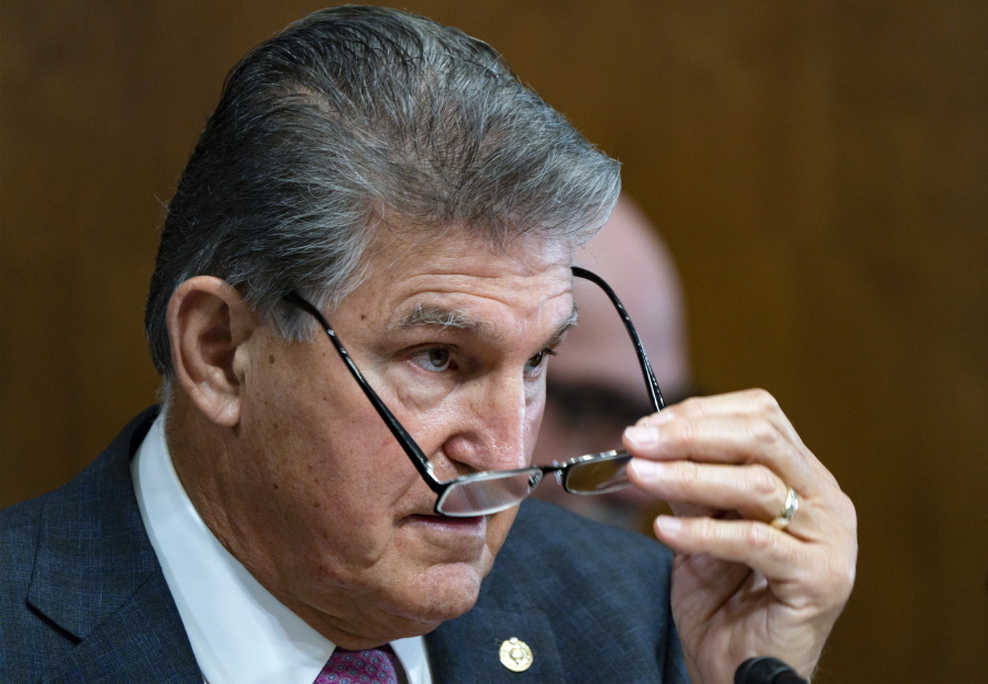 Sen. Joe Manchin, D-W.Va., a key holdout vote on President Joe Biden's domestic agenda, chairs a hearing of the Senate Energy and Natural Resources Committee, at the Capitol in Washington, Tuesday, Oct. 19, 2021. (AP Photo/J.