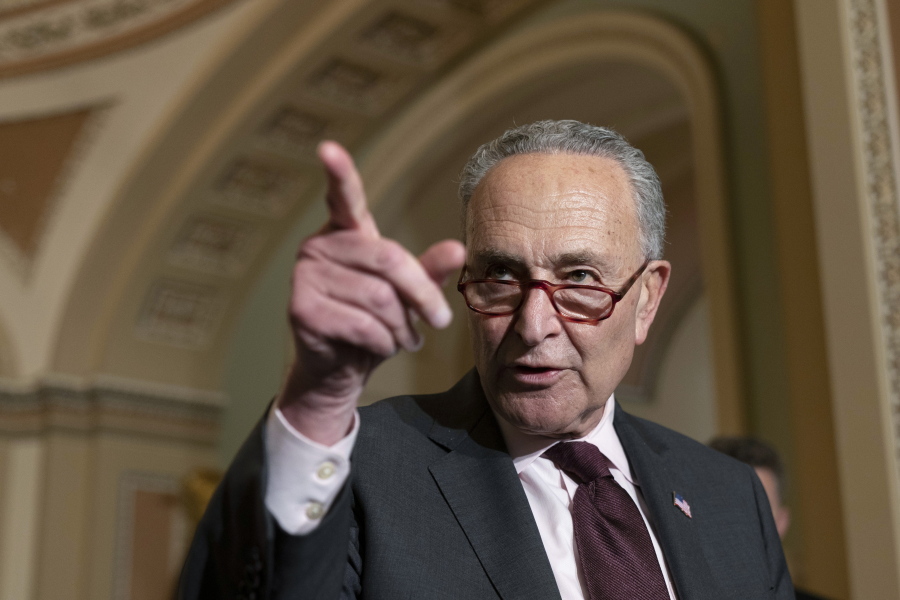 Senate Majority Leader Chuck Schumer of N.Y., calls on a reporter as he speaks after a Democratic policy luncheon, Tuesday, Oct. 19, 2021, on Capitol Hill in Washington.