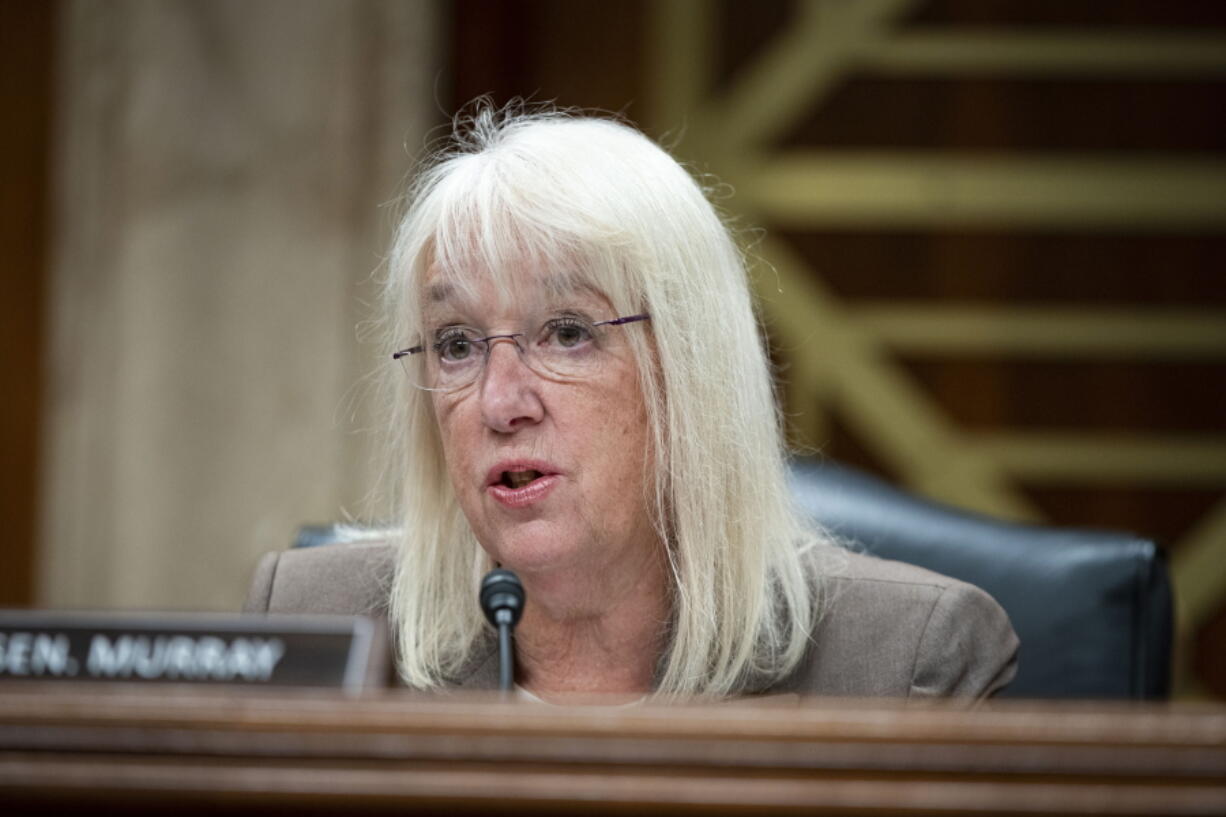 FILE - In this June 9, 2021, file photo, Sen. Patty Murray, D-Wash., speaks during a Senate Appropriations Subcommittee hearing on Capitol Hill in Washington. Murray who was elected in 1992 as a self described "mom in tennis shoes," has been fighting for paid family and medical leave for decades. For much of this year she appeared to be close to winning.