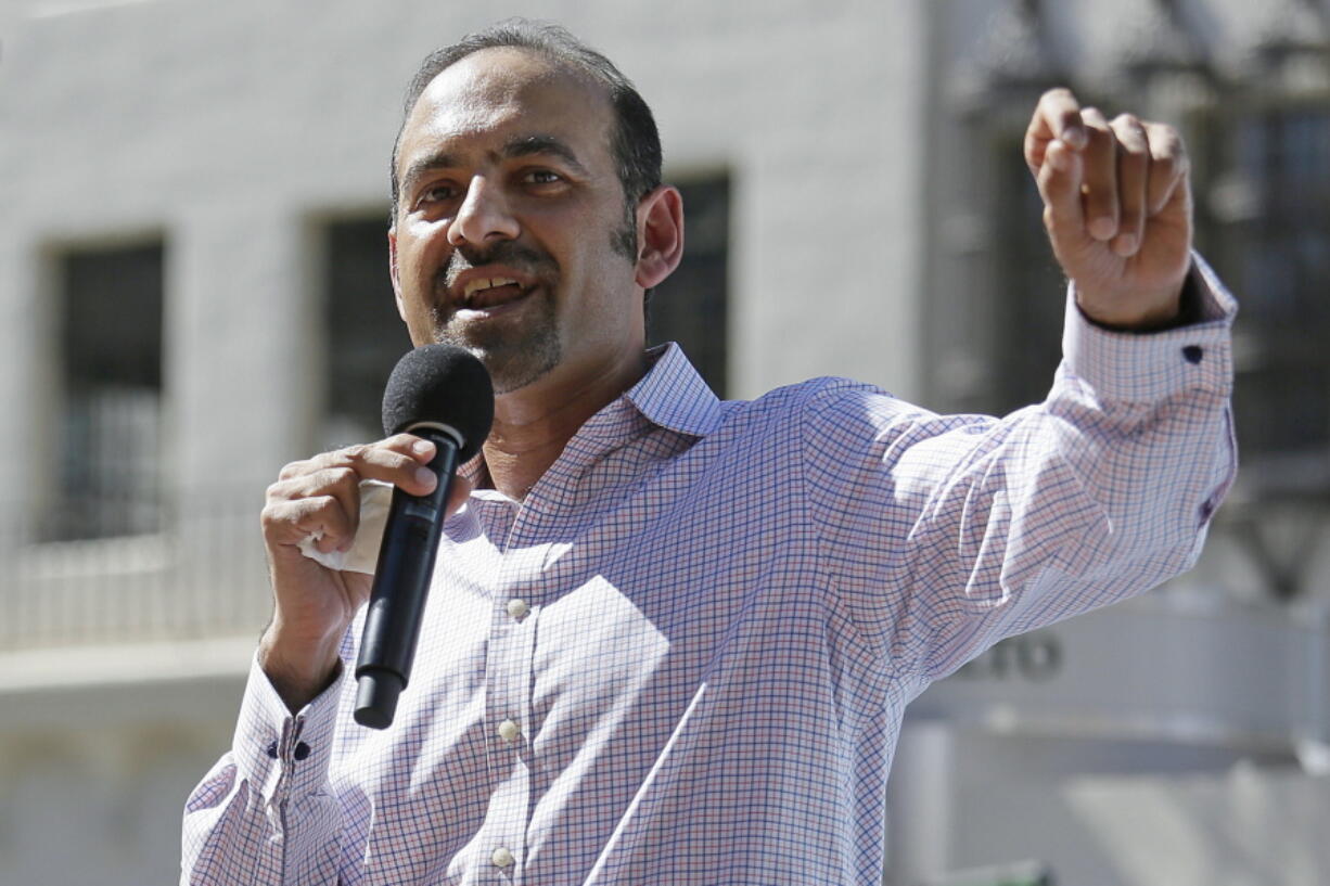 FILE - In this March 14, 2017, file photo Dilawar Syed, president of the software company Freshdesk, speaks during a Tech Stands Up rally outside City Hall in Palo Alto, Calif. If Syed is confirmed as deputy administrator of the Small Business Administration, he will be the highest-ranking Muslim in U.S. government.