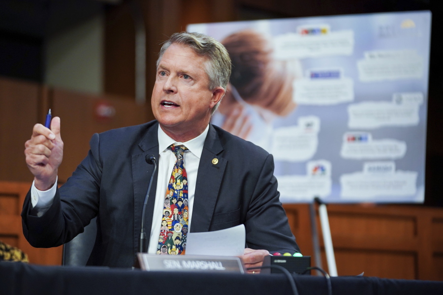 FILE - In this Sept. 20, 2021, file photo, Sen. Roger Marshall, R-Kan., speaks during a Senate Health, Education, Labor, and Pensions Committee hearing to discuss reopening schools during the COVID-19 pandemic on Capitol Hill in Washington. Marshall won't let people forget he's a doctor by putting "Doc" in the letterhead of his U.S. Senate office news releases. But when it comes to COVID-19 vaccines, other doctors think he sounds far less like a doctor and far more like a politician rallying hard-right supporters.