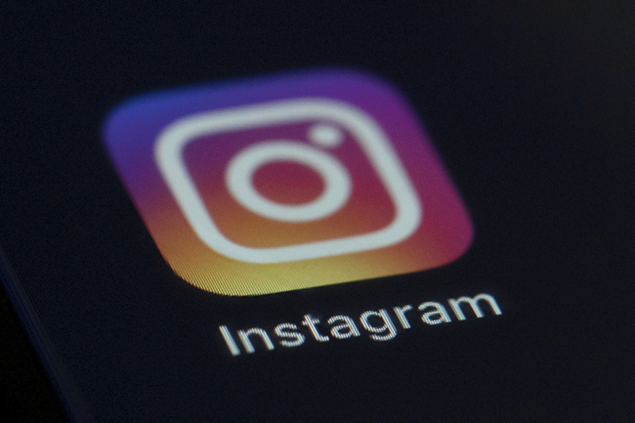 FILE - This Aug. 23, 2019, file photo, shows the Instagram app icon on the screen of a mobile device in New York. Damning newspaper reports based on the company's own research found that Facebook knew about the harms Instagram can cause to teenagers -- especially teen girls -- when it comes to mental health and body image issues.