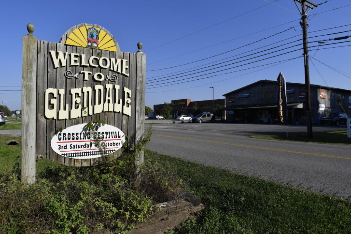 A sign welcomes visitors to the tiny town of Glendale, Ky., the site of a joint venture with Ford Motor Company and SK Innovation to create the $5.8 billion BlueOvalSK Battery Park in Glendale, Ky., Monday, Sept. 27, 2021. The dedicated battery manufacturing complex will be creating 5000 jobs, and is intended to supply Ford's North American assembly plants with locally assembled batteries. (AP Photo/Timothy D.