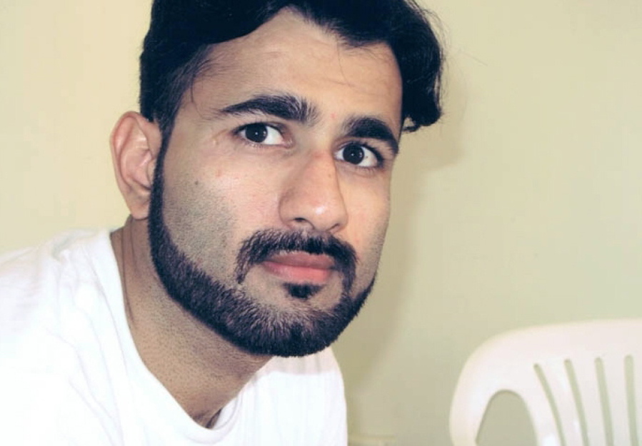 This 2018 photo provided by the Center for Constitutional Rights shows Majid Khan.  The much-criticized war crimes tribunal at the Guantanamo Bay Naval Station reached a milestone on Oct. 28, 2021, with the sentencing of Majid Khan, a former resident of the Baltimore suburbs who pleaded guilty to terrorism and other offenses and agreed to cooperate with U.S. authorities prosecuting five men charged in the Sept. 11, 2001, attacks.