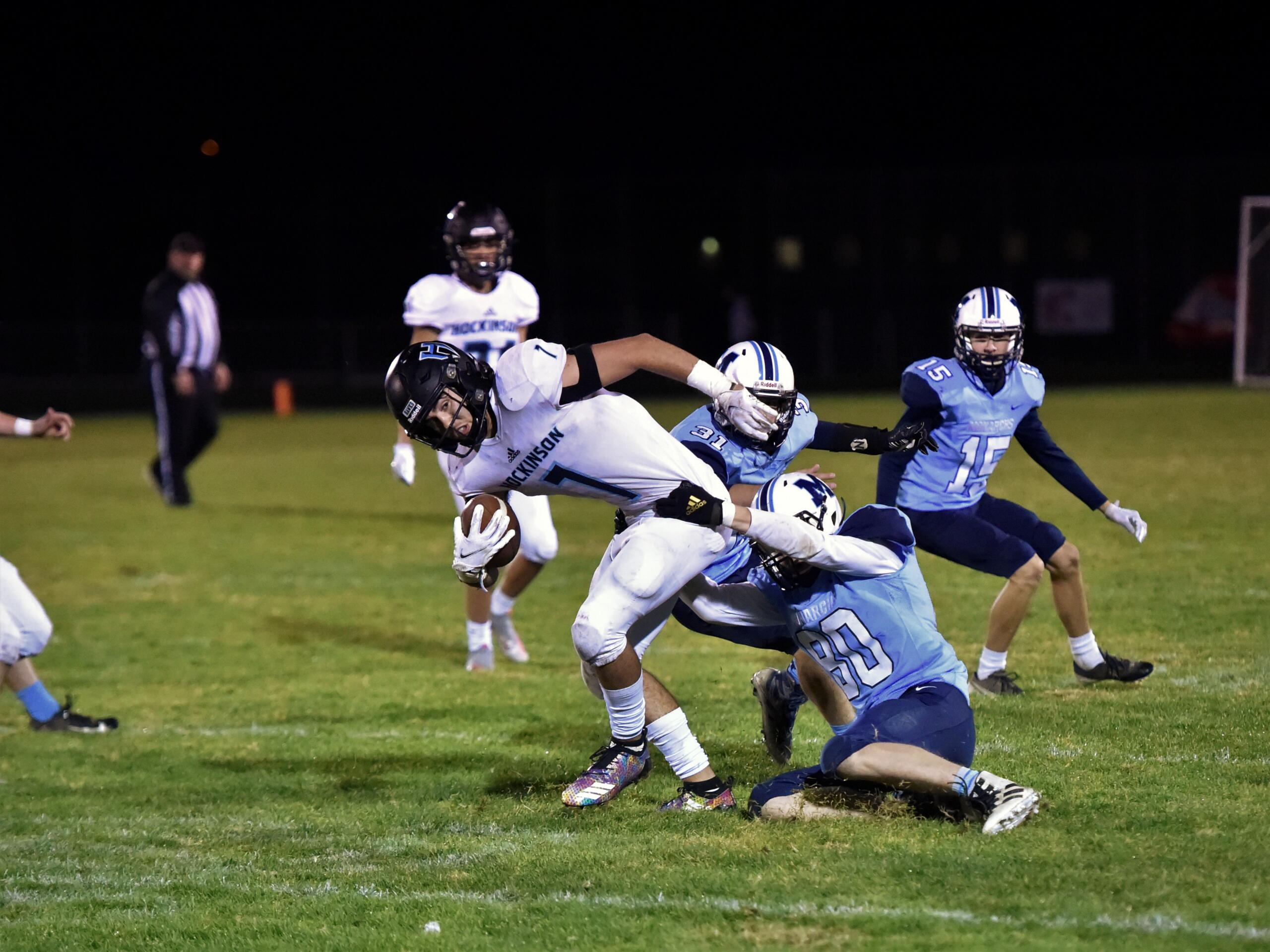 Hockinson’s Hale Prior (7) is spun around as he breaks free of a Mark Morris defender on Friday, Oct. 15, in Longview.
