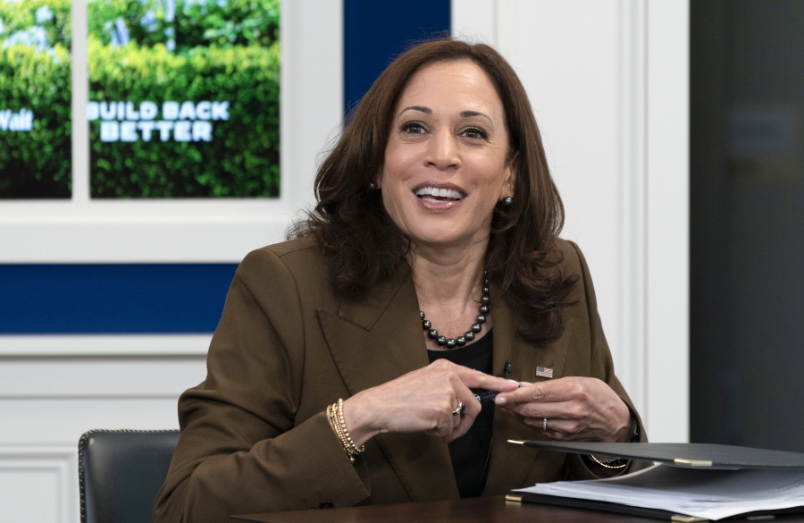 Vice President Kamala Harris, smiles at Sen. Tammy Duckworth, D-Ill., not pictured, at the conclusion of a virtual town hall where they discussed different care policies ranging from at-home medical care to childcare, Thursday, Oct. 14, 2021, in the South Court Auditorium on the White House complex in Washington.