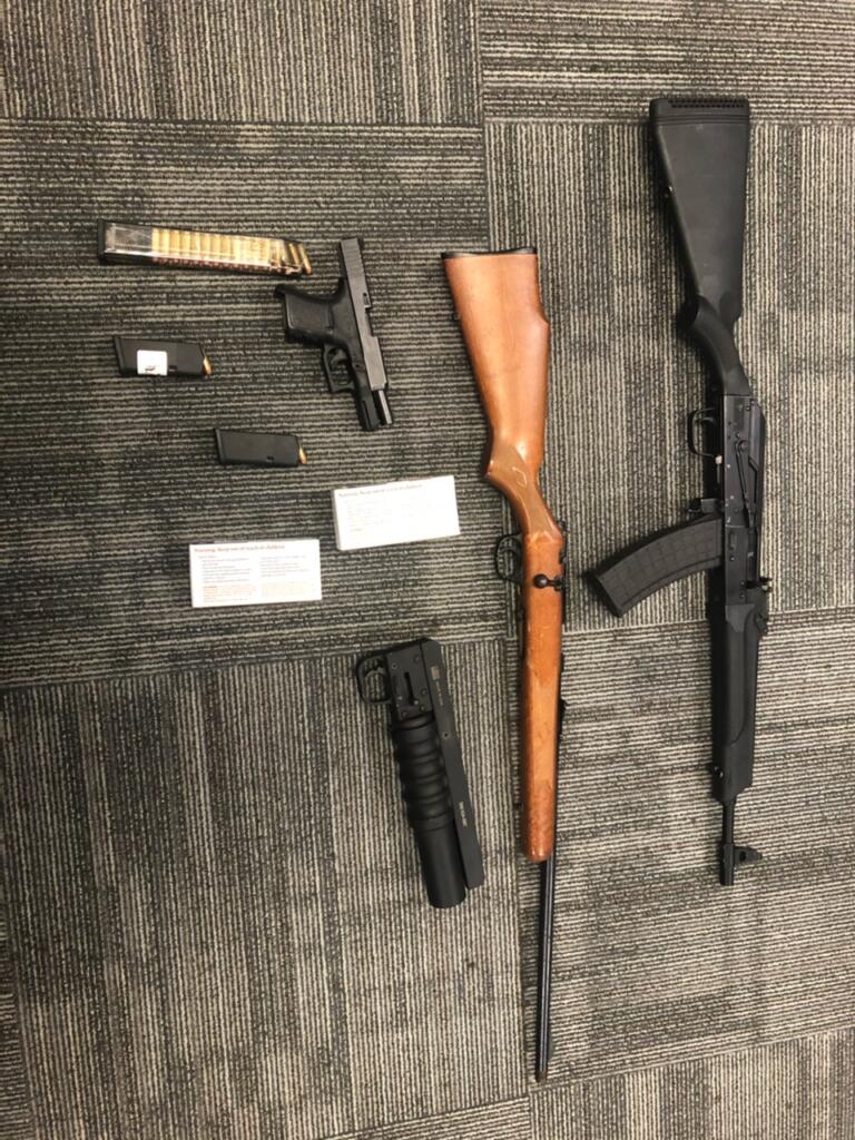 Clark County sheriff's deputies seized several firearms, ammunition and accessories Friday, including a handgun and ammunition of the same caliber used in the Sept. 22 drive-by shooting on Northeast Padden Parkway.