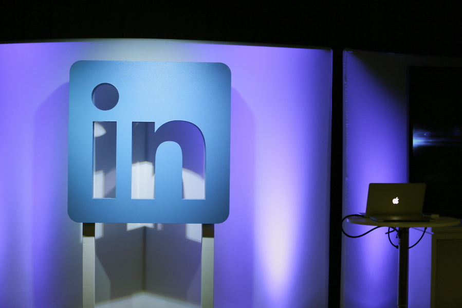 FILE - In this Thursday, Sept. 22, 2016, file photo, the LinkedIn logo is displayed during a product announcement in San Francisco.  Microsoft says it is shutting down its LinkedIn service in China later this year following tighter government censorship rules. The company said in a blog post Thursday, Oct.