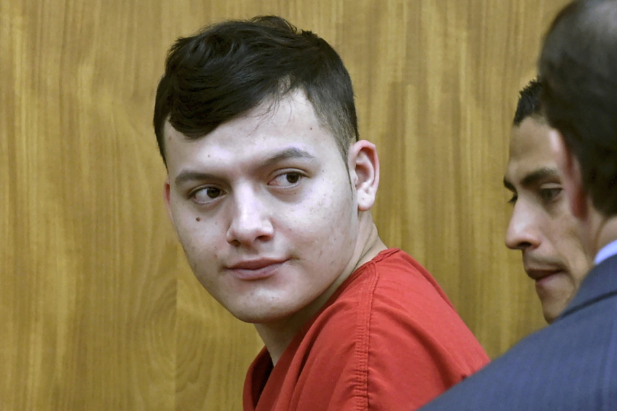 FILE - In this May 20, 2019, file photo, Wilber Ernesto Martinez-Guzman, from El Salvador, appears in Washoe District Court in Reno, Nev. The 22-year-old Salvadoran immigrant who was facing two death penalty trials in the killings of four people in northern Nevada will plead guilty Thursday, Oct. 21, 2021, in an agreement that will put him in prison for the rest of his life, a prosecutor said.