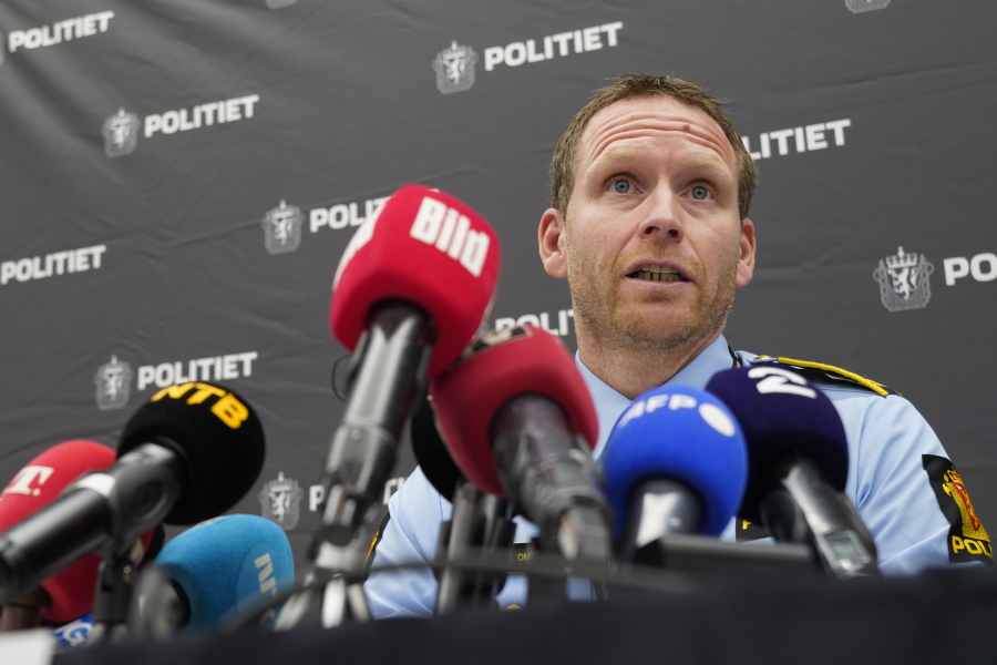 Police Inspector Per Thomas Omholt holds a press conference about the development in the murder case in Kongsberg, Norway, Friday, Oct. 15, 2021. The suspect in a bow-and-arrow attack that killed five people and wounded three in a small Norwegian town is facing a custody hearing Friday. He won't appear in court because he has has confessed to the killings and has agreed to being held in custody.