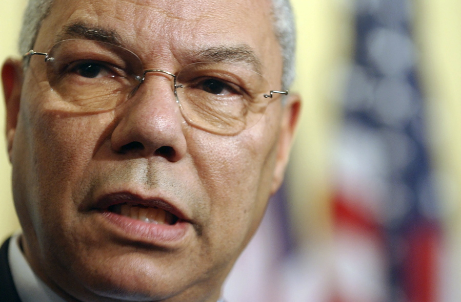 FILE - U.S. Secretary of State Colin Powell makes a statement to the media after a meeting at U.N. headquarters, Thursday, Aug. 21, 2003. Powell, former Joint Chiefs chairman and secretary of state, has died from COVID-19 complications. In an announcement on social media Monday, Oct. 18, 2021 the family said Powell had been fully vaccinated. He was 84.