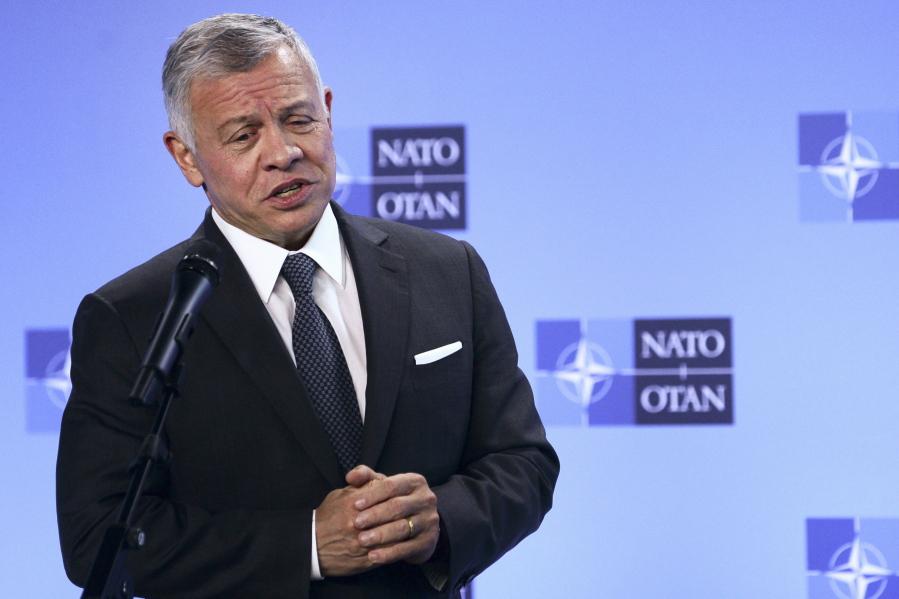 FILE - Jordan's King Abdullah II speaks during a media conference prior to a meeting with NATO Secretary General Jens Stoltenberg at NATO headquarters in Brussels, in this Wednesday, May 5, 2021, file photo. Hundreds of world leaders, powerful politicians, billionaires, celebrities, religious leaders and drug dealers have been stashing away their investments in mansions, exclusive beachfront property, yachts and other assets for the past quarter century, according to a review of nearly 12 million files obtained from 14 different firms located around the world. The report released Sunday, Oct. 3, 2021, by the International Consortium of Investigative Journalists involved 600 journalists from 150 media outlets in 117 countries. Jordan's King Abdullah II is one of 330 current and former politicians identified as beneficiaries of the secret accounts.