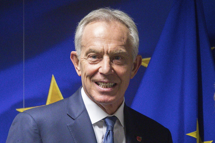 FILE - Former British Prime Minister Tony Blair is shown ahead of a meeting at the EU Charlemagne building in Brussels, in this Wednesday, Nov. 6, 2019, file photo. Hundreds of world leaders, powerful politicians, billionaires, celebrities, religious leaders and drug dealers have been stashing away their investments in mansions, exclusive beachfront property, yachts and other assets for the past quarter century, according to a review of nearly 12 million files obtained from 14 different firms located around the world. The report released Sunday, Oct. 3, 2021,  by the International Consortium of Investigative Journalists involved 600 journalists from 150 media outlets in 117 countries. Former British Prime Minister Tony Blair is one of 330 current and former politicians identified as beneficiaries of the secret accounts.