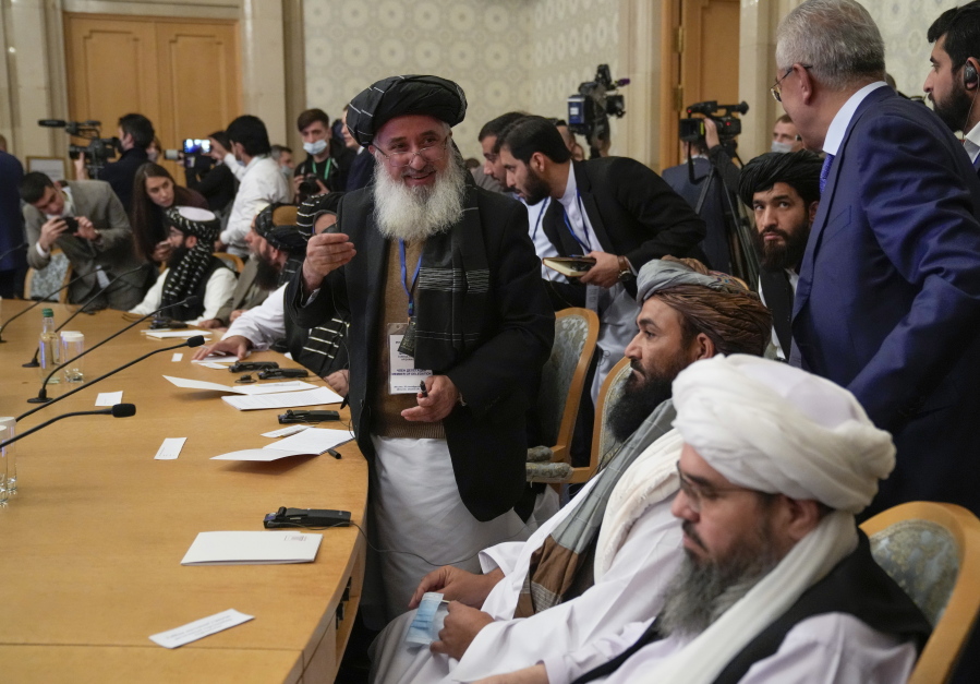 Members of the political delegation from the Afghan Taliban's movement attend talks involving Afghan representatives in Moscow, Russia, Wednesday, Oct. 20, 2021. Russia invited the Taliban and other Afghan parties for talks voicing hope they will help encourage discussions and tackle Afghanistan's challenges.