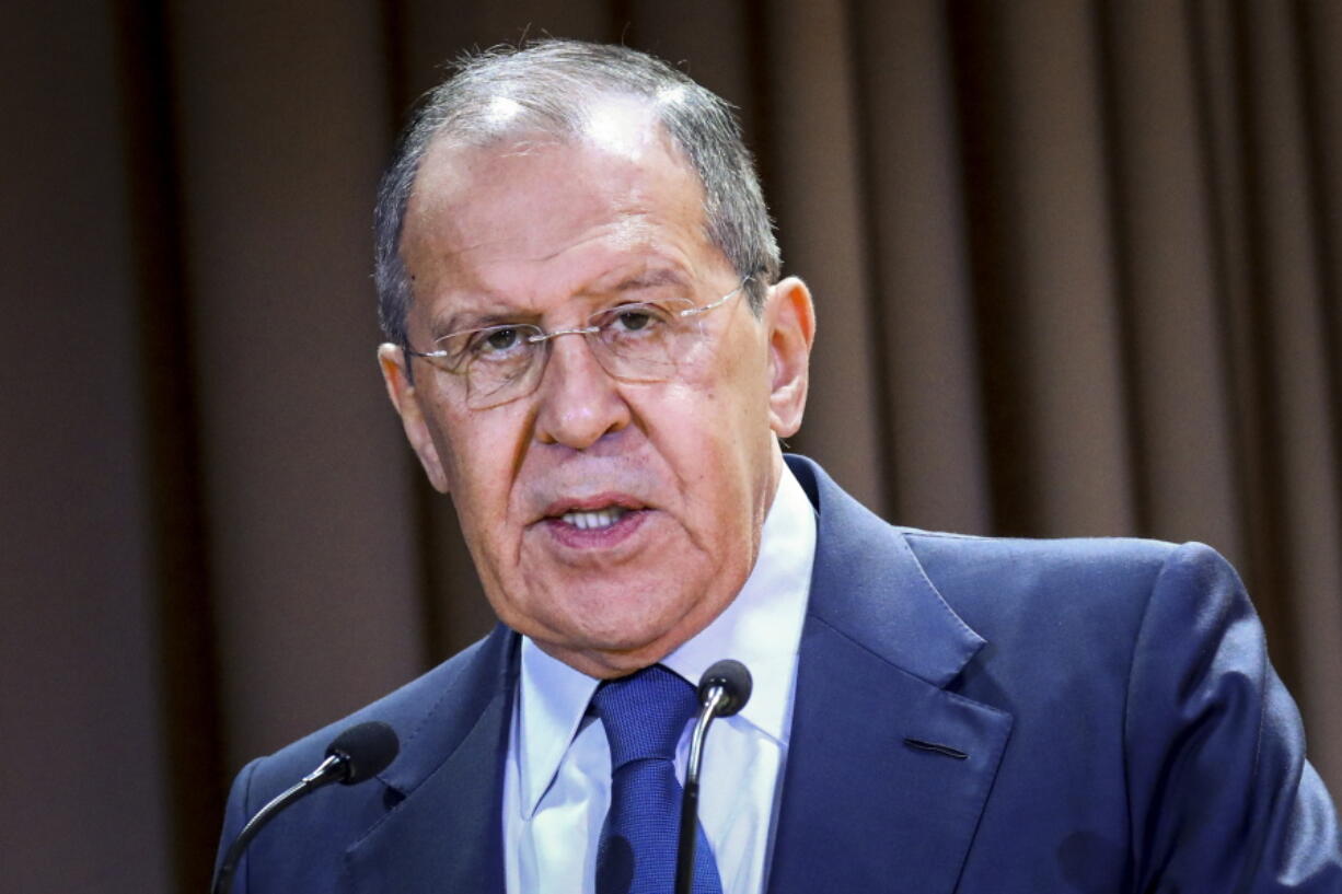 In this handout photo released by the Russian Foreign Ministry Press Service, Russian Foreign Minister Sergey Lavrov speaks on the side of the meeting dedicated to the 25th anniversary of the House of Russian Diaspora named after Alexander Solzhenitsyn in Moscow, Russia, Monday, Oct. 18, 2021. Russia's foreign minister says that the country is suspending its mission to NATO. Lavrov said Monday that the move is in response to last week's expulsion by NATO of eight members of Russia's mission to the military alliance. NATO said that they were secretly working as intelligence officers and halved the size of Moscow's team able to work at its headquarters.