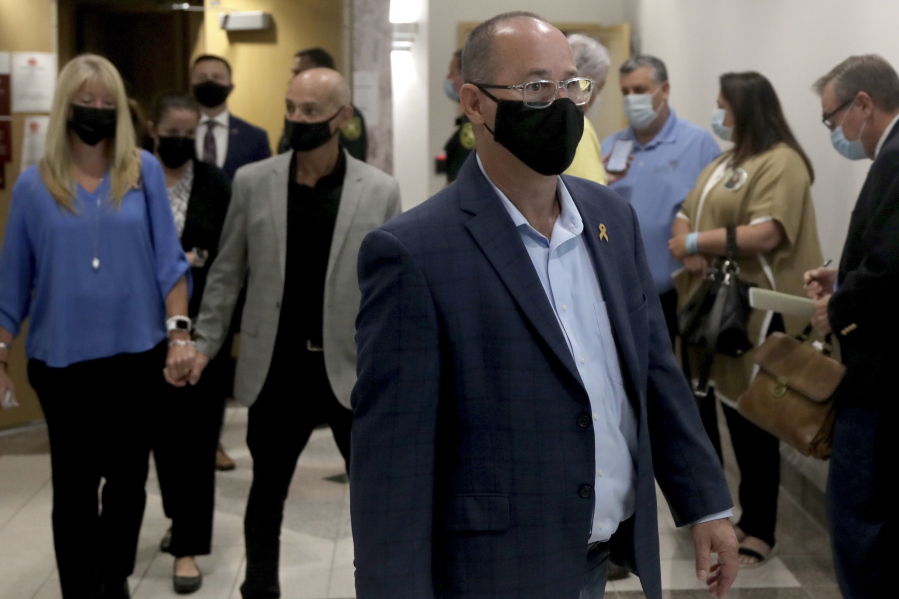 Fred Guttenberg, the father of slain student Jaime Guttenberg leaves the courtroom at the Broward County Courthouse in Fort Lauderdale, Fla., Wednesday, Oct. 20, 2021, after Marjory Stoneman Douglas High School shooter Nikolas Cruz pleaded guilty to murder in the 2018 massacre that left 17 dead at a Parkland, Fla., high school. Guttenberg is joining the top ranks of a progressive anti-gun group to promote like-minded political candidates around the country ahead of next year's midterm elections. He will be a senior adviser to Brady PAC.