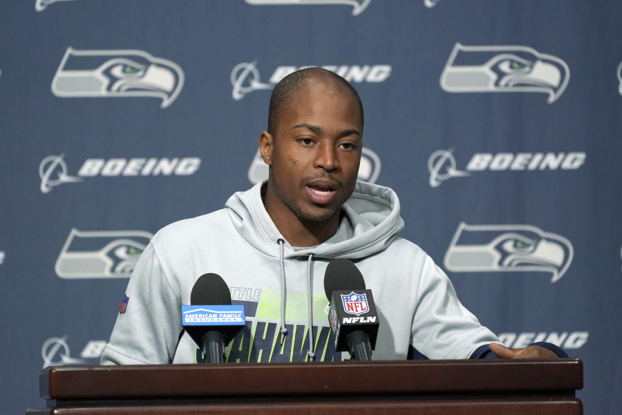 Seattle Seahawks wide receiver Tyler Lockett talks to reporters, Wednesday, Sept. 22, 2021, in Renton, Wash. The Seahawks are scheduled to play the Minnesota Vikings on Sunday in an NFL football game. (AP Photo/Ted S.