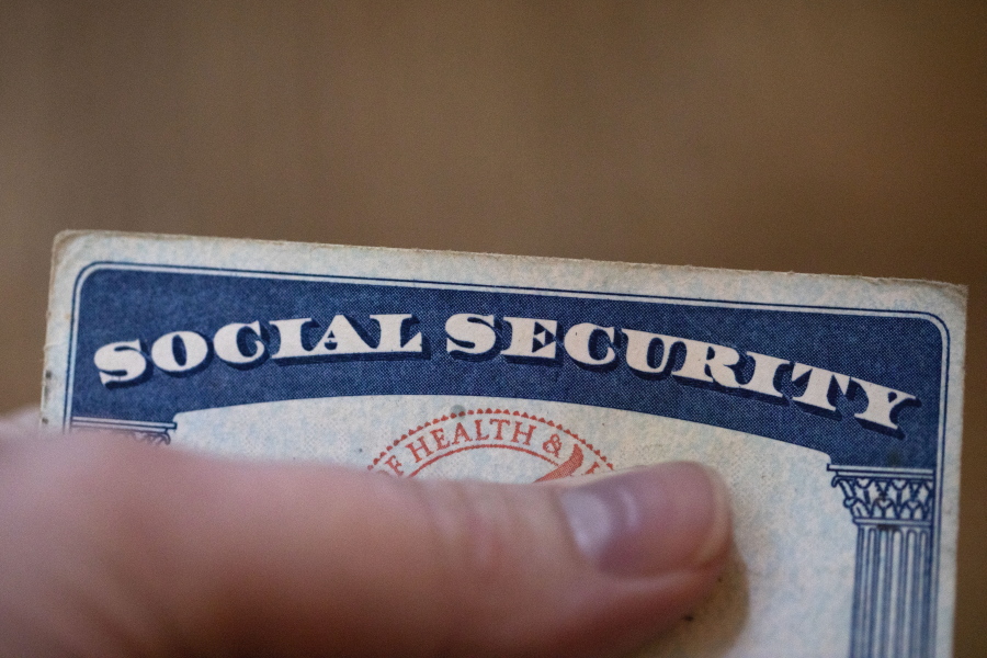 This Tuesday, Oct. 12, 2021, photo shows a Social Security card in Tigard, Ore.  Millions of retirees on Social Security will get a 5.9% boost in benefits for 2022. The biggest cost-of-living adjustment in 39 years follows a burst in inflation as the economy struggles to shake off the drag of the coronavirus pandemic.