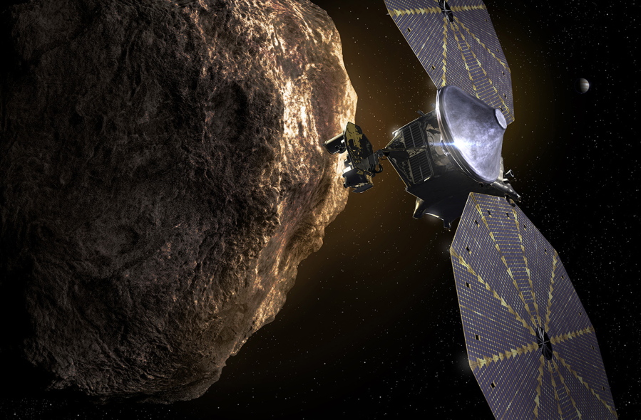 The Lucy spacecraft approaching an asteroid.