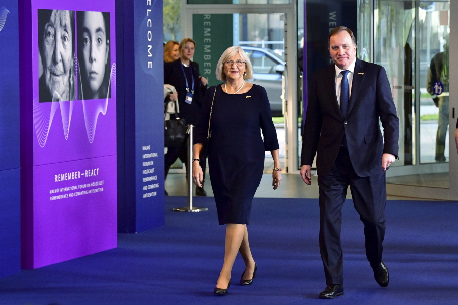 Swedish Prime Minister Stefan Lofven, right, and his wife Ulla arrive at the Malmoe International Forum on Holocaust Remembrance and Combating Antisemitism in Malmoe, Sweden, Wednesday, Oct. 13, 2021.