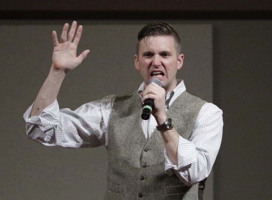 FILE - In this Dec. 6, 2016, file photo, Richard Spencer, who leads a movement that mixes racism, white nationalism and populism, speaks at the Texas A&M University campus in College Station, Texas. A trial is beginning in Charlottesville, Virginia to determine whether white nationalists who planned the so-called "Unite the Right" rally will be held civilly responsible for the violence that erupted.   (AP Photo/David J.