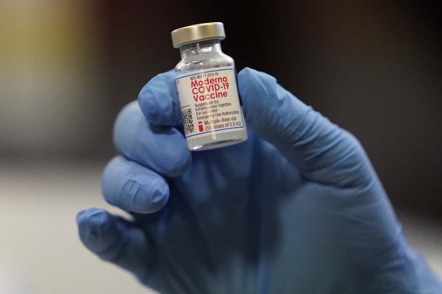 FILE - This Tuesday, Jan. 5, 2021 file photo shows a vial of the Moderna COVID-19 vaccine at a pop-up vaccine clinic in Salt Lake City. U.S. regulators expect to rule Wednesday, Oct. 20, 2021 on authorizing booster doses of the Moderna and Johnson & Johnson COVID-19 vaccines, a Food and Drug Administration official said at a government meeting.