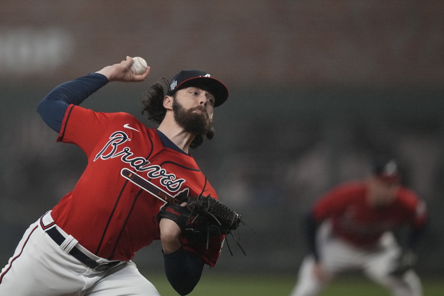 Atlanta Braves starting pitcher Ian Anderson throws during the first inning in Game 3 of baseball's World Series between the Houston Astros and the Atlanta Braves Friday, Oct. 29, 2021, in Atlanta. (AP Photo/David J.