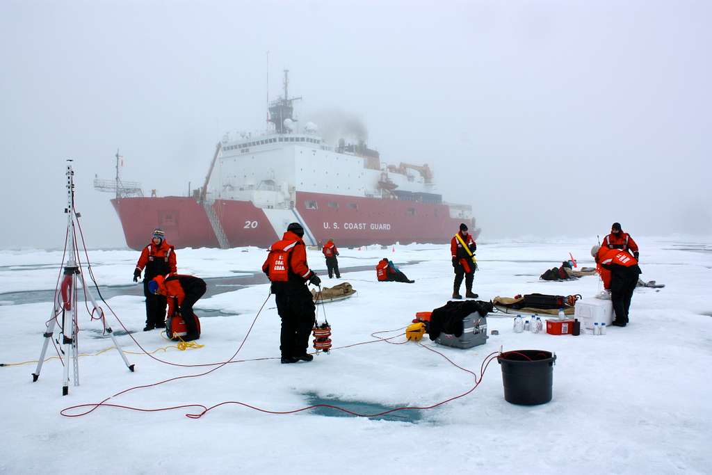 Teams of scientists set up equipment on sea ice not far from the U.S. Coast Guard icebreaker Healy in the Chukchi Sea on July 4, 2010, where they spent the day collecting data. The research is part of NASA's ICESCAPE oceanographic mission to sample the physical, chemical and biological characteristics of the ocean and sea ice.  Impacts of Climate change on the Eco-Systems and Chemistry of the Arctic Pacific Environment ICESCAPE is a multi-year NASA shipborne project. The bulk of the research took place in the Beaufort and Chukchi Seas in summer of 2010 and fall of 2011.