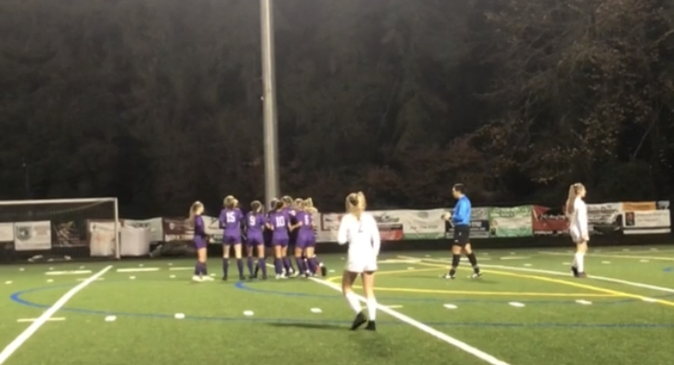 Columbia River players celebrate Anna Iniguez’s goal in the 50th minute of their state playoff game Wednesday against White River.