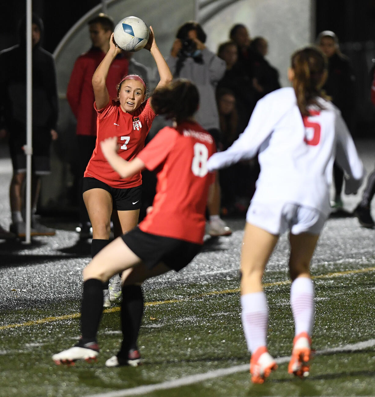Camas junior Hannah Terry, left, throws the ball in bounds Wednesday, Nov. 10, 2021, during the Papermakers' 2-0 win against Kennedy Catholic in the first round of the 4A state tournament at Doc Harris Stadium in Camas.