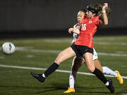 Camas senior Lily Loughney (16) shoots the ball Wednesday, Nov. 10, 2021, during the Papermakers' 2-0 win against Kennedy Catholic in the first round of the 4A state tournament at Doc Harris Stadium in Camas.