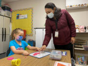 ESD-U program graduate Veronica Paredes teaches one of her students.