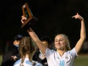 Hockinson's Kylie Ritter, with tears in her eyes, points toward the second-place trophy in the 2A State Championship on Saturday, Nov. 20, 2021, at Shoreline Stadium. The Hawks settled for their second straight runner-up finish after a 2-0 loss to top-ranked Archbishop Murphy.