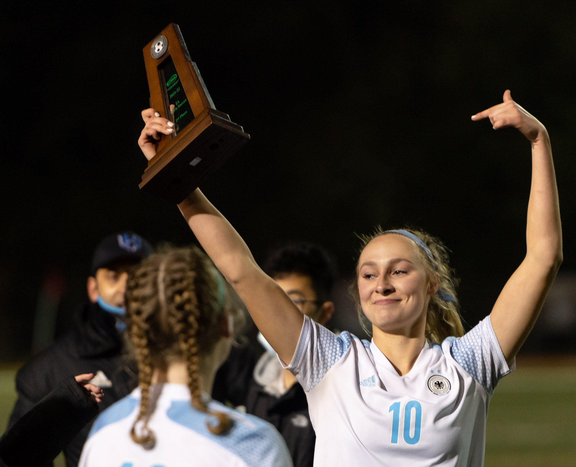 Hockinson's Kylie Ritter, with tears in her eyes, points toward the second-place trophy in the 2A State Championship on Saturday, Nov. 20, 2021, at Shoreline Stadium. The Hawks settled for their second straight runner-up finish after a 2-0 loss to top-ranked Archbishop Murphy.