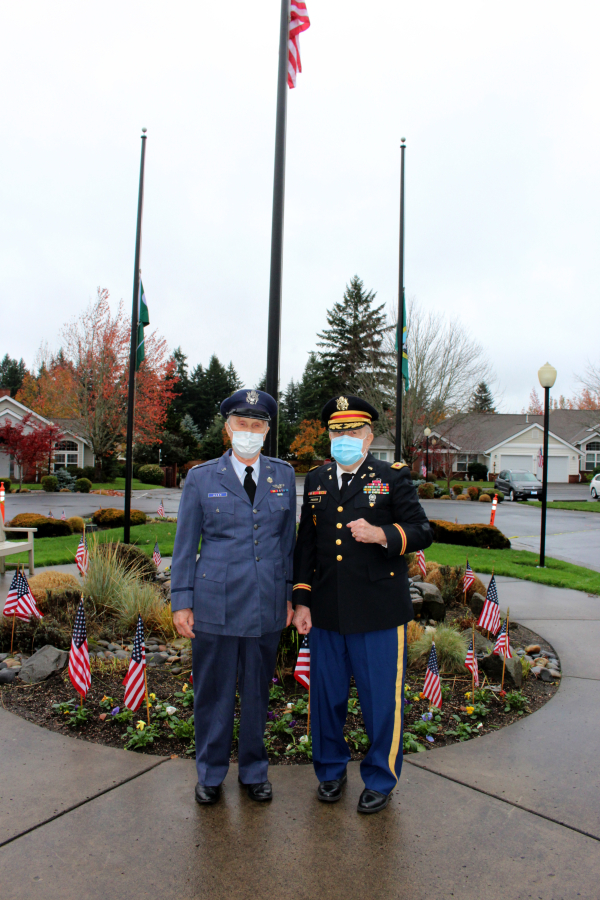 Retired Air Force Capt. Larry Bone, who received a Joint Services Commendation, left, and retired Army Col. Jonathan Frederick, who served more than 30 years, pose in uniform during Touchmark at Fairway Village's Veterans Day celebration.