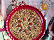 This Pecan Bourbon Pie is my mother's recipe, chock full of nuts and old-fashioned rolled oats.