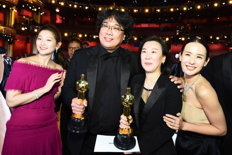 In this handout photo provided by the Academy of Motion Picture Arts and Sciences, Best Picture Award winners for "Parasite" pose onstage during the 92nd Annual Academy Awards at the Dolby Theatre on Feb. 9, 2020, in Hollywood, California. (Matt Petit/Handout/A.M.P.A.S.