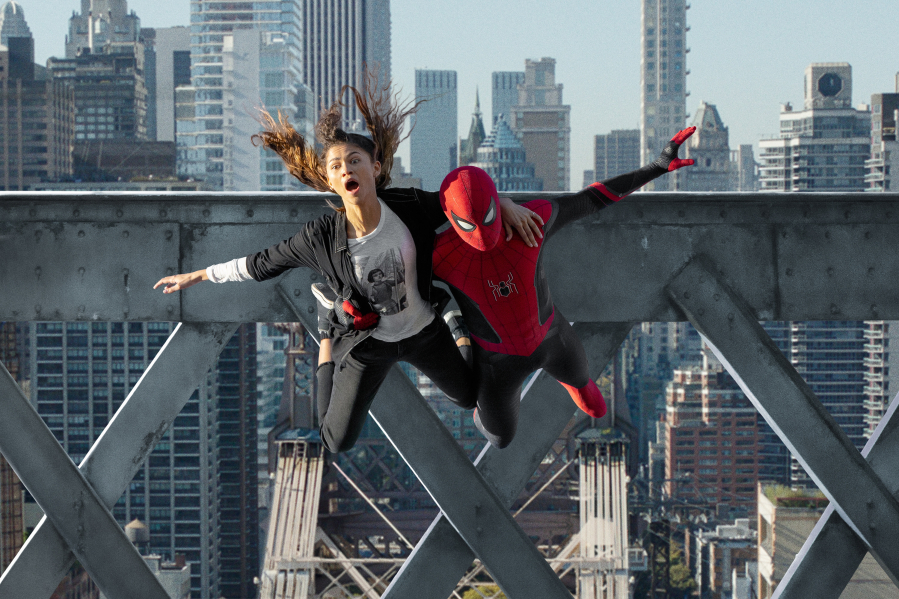 MJ (Zendaya) and Spider-Man (Tom Holland) jump off a bridge in "Spider-Man: No Way Home." (Matt Kennedy/Sony Pictures)
