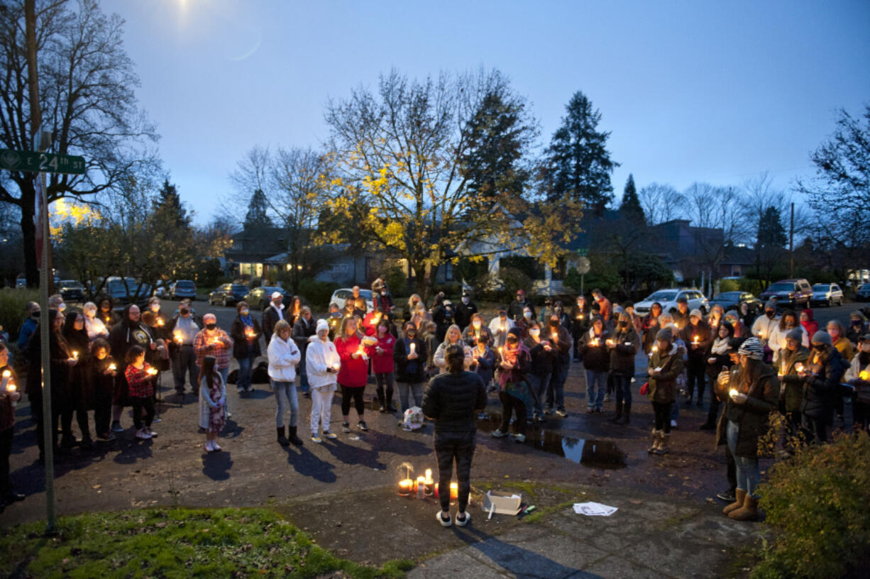 About 100 people gathered Saturday for a candlelight vigil for Monica "Star" Murrah, whose estranged husband is accused of fatally stabbing her Nov. 7 at her Arnada neighborhood home in Vancouver. Among those who memorialized Murrah as a "positive light," some who attended the vigil also shared their own experiences with domestic violence.
