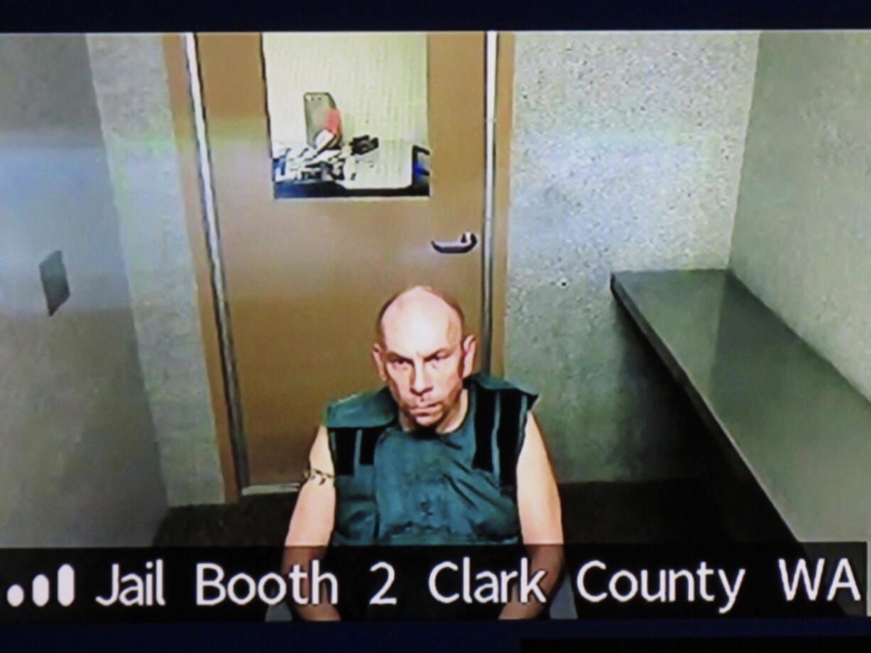 Rick LHW "Left Handed Wolf" Stone, 44, appears Feb. 5 via Zoom in Clark County Superior Court on suspicion of attempted first-degree murder and first-degree arson. A jury found Stone guilty Monday.