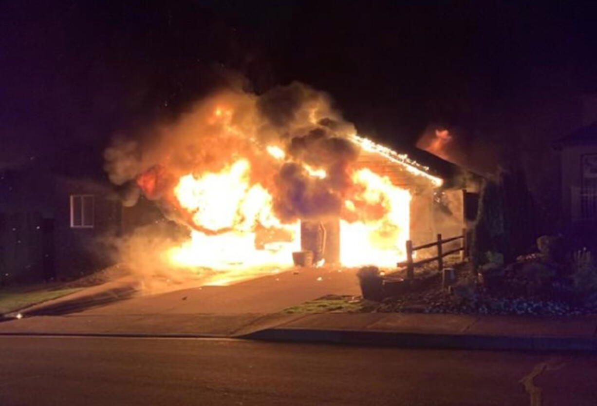 The garage of a Washougal house on 43rd Street caught fire Wednesday night and displaced a family of three. The Camas-Washougal Fire Marshal's Office said the house is likely a total loss.
